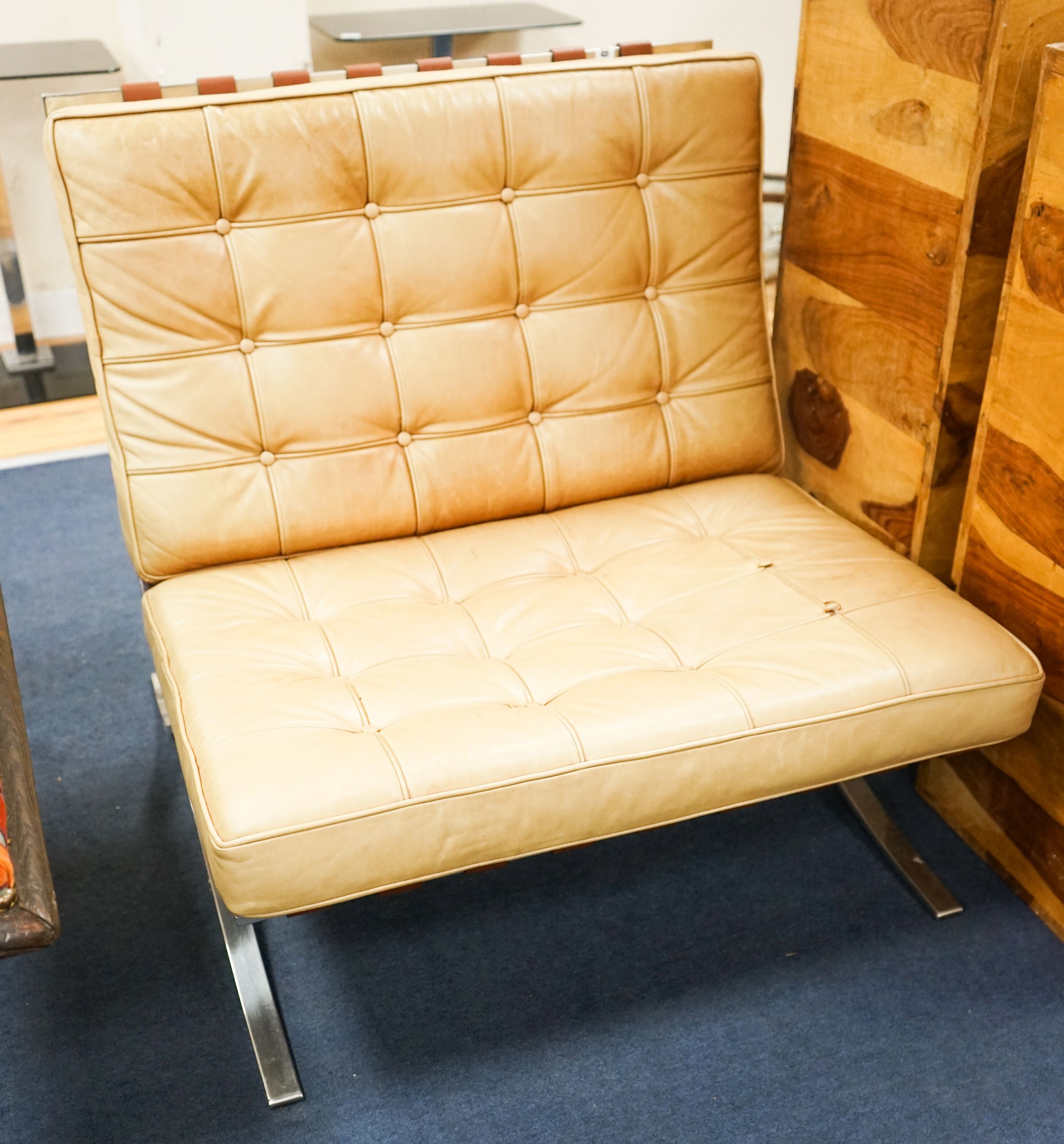 A brown leather and chrome Barcelona type chair, width 76cm, depth 70cm, height 74cm